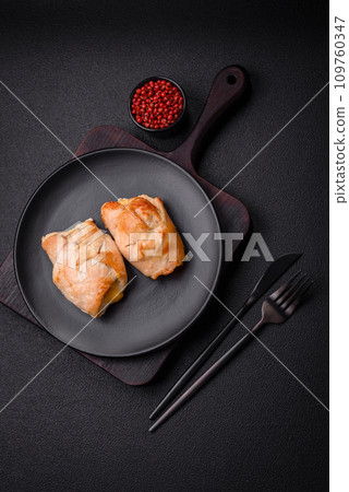 Delicious fresh meat roll made from chicken fillet, mushrooms, spices and herbs 109760347