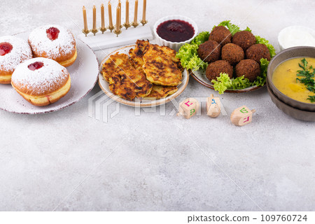 Traditional Jewish holiday Hanukkah food. 109760724