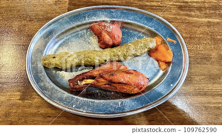 Indian Nepali cuisine shish kebab, turmeric tikka and malai tikka 109762590