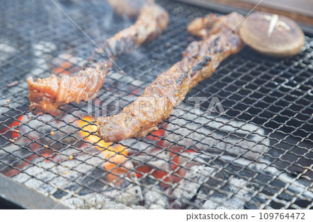 charcoal-grilled meat 109764472