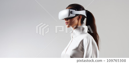 Caucasian brunette woman in virtual reality glasses on white background. Copy space. Banner template of person in white VR goggles. Concept of technology, game, entertainment, artificial intelligence Caucasian brunette woman in virtual reality glasses on white background. Copy space. Banner template of person in white VR goggles. Concept of technology, game, entertainment, artificial intelligence 109765308