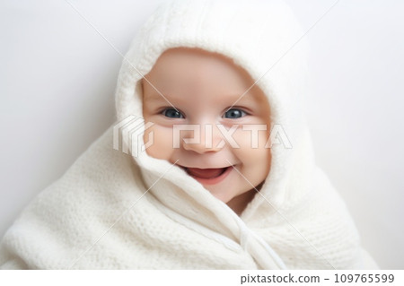Adorable newborn baby wrapped in white blanket smiles with joy and happy. Small child. Portrait on white background with copy space. Advertising, Banner, Poster, Children's Store. Purity, innocence Adorable newborn baby wrapped in white blanket smiles with joy and happy. Small child. Portrait on white background with copy space. Advertising, Banner, Poster, Children's Store. Purity, innocence 109765599