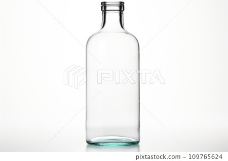 Transparent clean empty Glass bottle without cap isolated on white background. Mockup, template for design. With copy space. Empty bottle for drink, juice, lemonade, milk, beer, alcohol, soda. 109765624