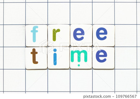 Colorful tile letter in word free time on white grid background 109766567