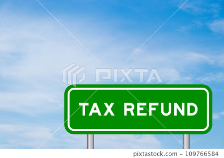 Green color transportation sign with word tax refund on blue sky with white cloud background Green color transportation sign with word tax refund on blue sky with white cloud background 109766584