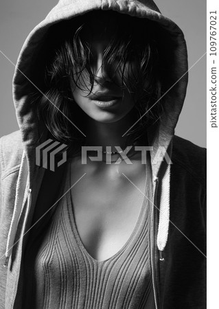 wet hair young woman in hood. sexy girl in hoodie 109767021