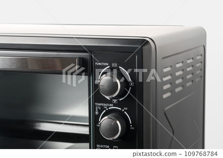 Close up of black mini electric oven home appliance 109768784