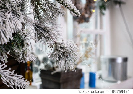 Christmas tree bulbs with yellow garlands, xmas tree with decorative bulbs. Christmas tree bulbs with yellow garlands, xmas tree with decorative bulbs. 109769455