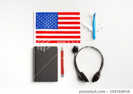 Flag of USA and headset on white background Flag of USA and headset on white background 109769656