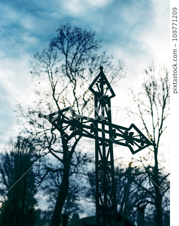 Metal cross at cemetery. Religious graveyard. Death Metal cross at cemetery. Religious graveyard. Death 109771209