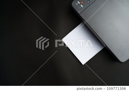 Modern laser printer on black background close up 109771306