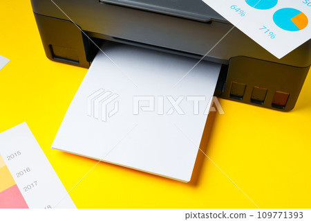 Modern printer with paper on yellow background 109771393