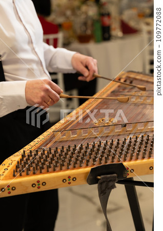 Cymbals at a wedding, Ukrainian national musical instrument Cymbals at a wedding, Ukrainian national musical instrument 109772088