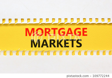 Mortgage markets symbol. Concept words Mortgage markets on beautiful yellow paper. Beautiful white paper background. Business mortgage markets concept. Copy space. Mortgage markets symbol. Concept words Mortgage markets on beautiful yellow paper. Beautiful white paper background. Business mortgage markets concept. Copy space. 109772244