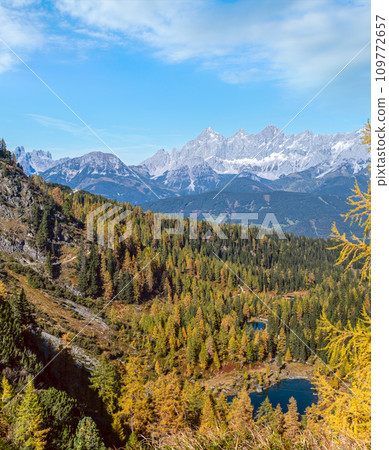 Calm autumn Alps mountain lake with clear transparent water and reflections. Untersee lake, Reiteralm, Steiermark, Austria. 109772657