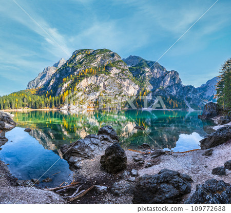 Autumn peaceful alpine lake Braies or Pragser Wildsee. Fanes-Sennes-Prags national park, South Tyrol, Dolomites Alps, Italy, Europe. Picturesque traveling, seasonal and nature beauty concept scene. 109772688