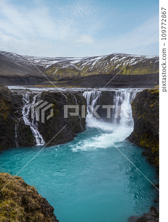 Picturesque waterfall Sigoldufoss autumn view. Season changing in southern Highlands of Iceland. Picturesque waterfall Sigoldufoss autumn view. Season changing in southern Highlands of Iceland. 109772867