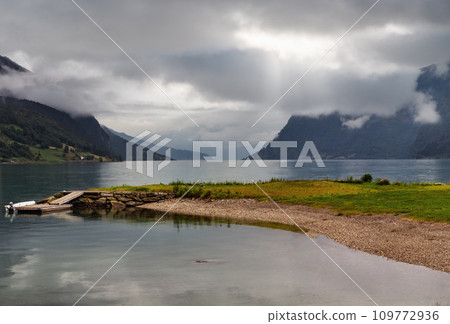 Summer cloudy Lustrafjorden fjord Summer cloudy Lustrafjorden fjord 109772936