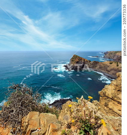 Summer Atlantic ocean rocky coastline (Algarve, Portugal). Summer Atlantic ocean rocky coastline (Algarve, Portugal). 109773336