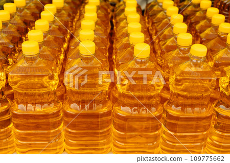 Plastic bottles with sunflower oil. Natural product. Food industry 109775662