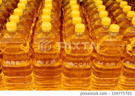 Plastic bottles with sunflower oil. Natural product. Food industry 109775785