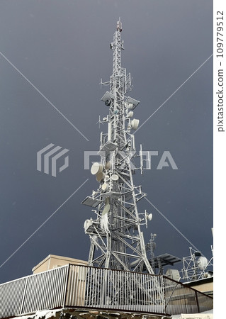 Transmitter tower frozen in winter frost 109779512