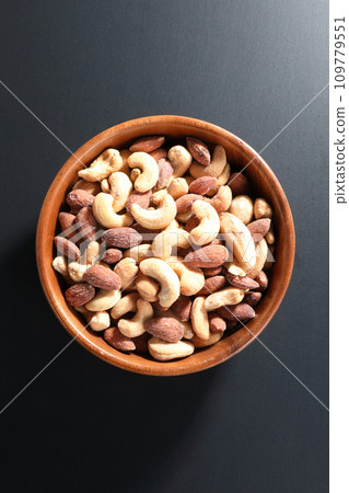 Mixed nuts served in a plate Mixed nuts served in a plate 109779551
