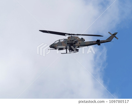 Ground Self-Defense Force anti-tank helicopter flying in the blue sky 109780517