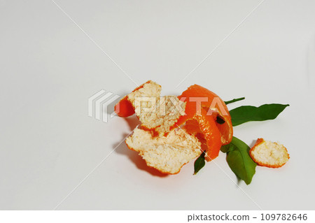 Tangerine peel on a white background. Tangerine peel on a white background. 109782646