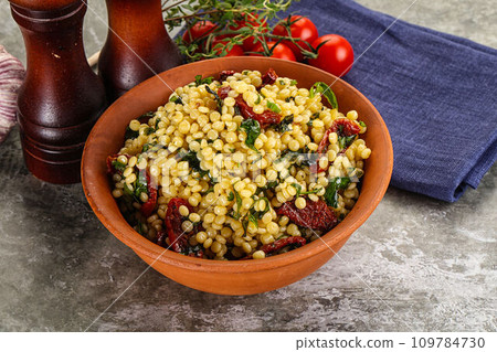 Vegetarian Pasta ptitim with vegetables 109784730