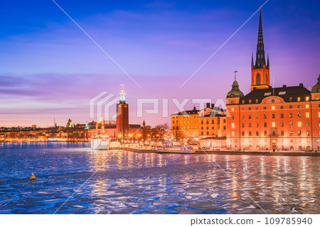 Stockholm, Sweden. Sunset over Gamla Stan and frozen Lake Malaren Stockholm, Sweden. Sunset over Gamla Stan and frozen Lake Malaren 109785940