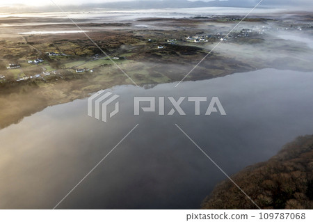 Aerial view of Lough fad in the morning fog, County Donegal, Republic of Ireland Aerial view of Lough fad in the morning fog, County Donegal, Republic of Ireland 109787068