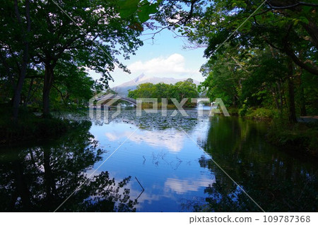 Hokkaido - View of Onuma, Kogetsu Bridge, Kinba Bridge, and Mt. Komagatake Hokkaido - View of Onuma, Kogetsu Bridge, Kinba Bridge, and Mt. Komagatake 109787368