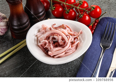 Delicous marinated squid tentacles in the bowl 109788956