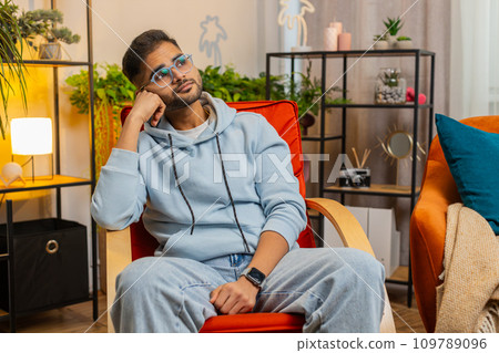 Indian man at home suffers from unfair situation problem, break up, depressed, feeling bad burnout 109789096