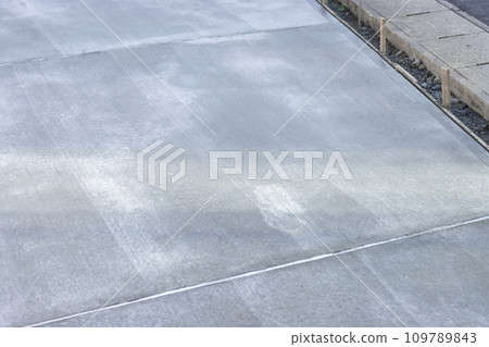 Garden of a private house 2 days after concrete curing 109789843