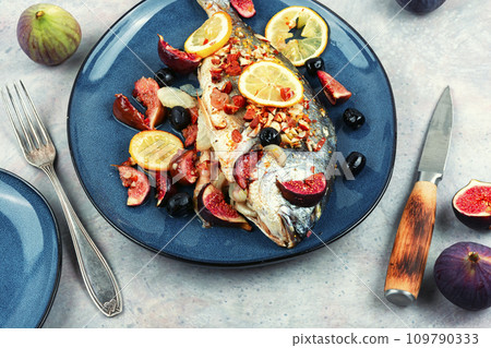 Tasty roasted dorado or gilt head bream fish Tasty roasted dorado or gilt head bream fish 109790333