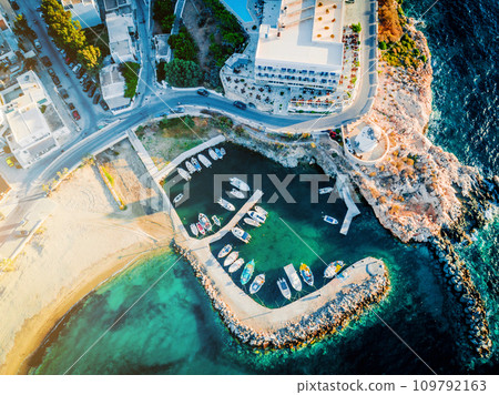 Small motorboats moored at dock, Paros island, Greece, view from above 109792163