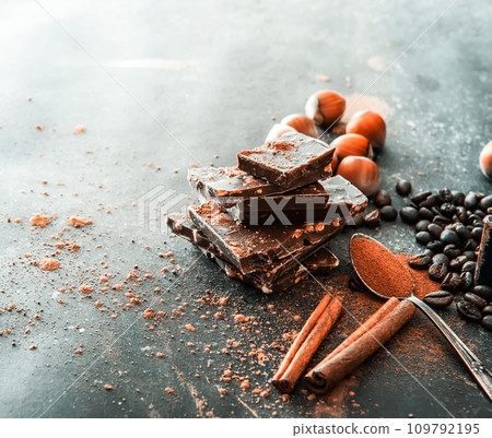 Chocolate, nuts, spices on table Chocolate, nuts, spices on table 109792195