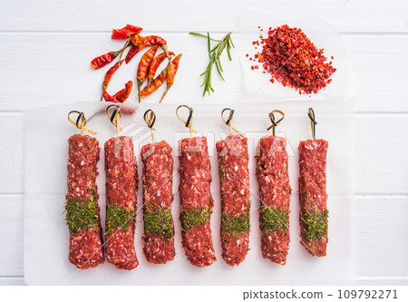 Raw kebab with spices Raw kebab with spices 109792271