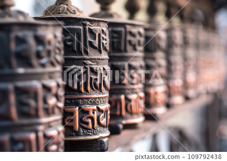 Prayer wheel in Buddhist temple, Kathmandu, Nepal Prayer wheel in Buddhist temple, Kathmandu, Nepal 109792438