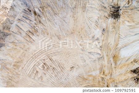 Aerial view of sandy quarry surface Aerial view of sandy quarry surface 109792591