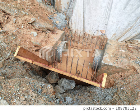 Melaka, Malaysia -February 2, 2022: Utility manhole under construction at a construction site. Built on site according to the engineer's design. Using plywood and timber as a construction mold Melaka, Malaysia -February 2, 2022: Utility manhole under construction at a construction site. Built on site according to the engineer's design. Using plywood and timber as a construction mold 109793122