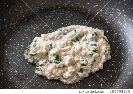 Tofu pancake dough baked in a frying pan Tofu pancake dough baked in a frying pan 109793199