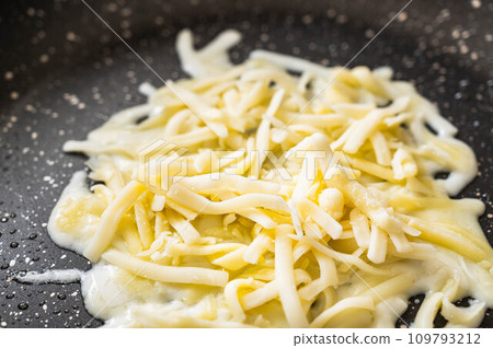 cheese fried in a frying pan 109793212
