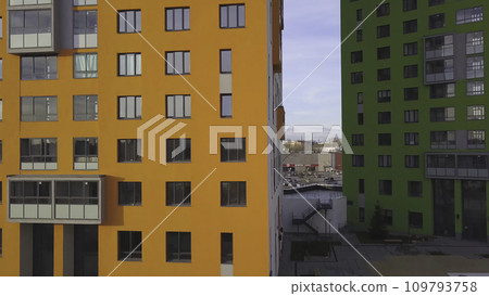 Top view of colored residential complex. Clip. Beautiful stylish houses of different colors in a luxury residential complex 109793758