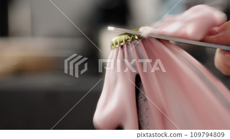 closeup open a bottle of berry soft drink which is over pressured and make a fountain closeup open a bottle of berry soft drink which is over pressured and make a fountain 109794809