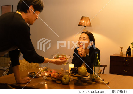 Husband serving home-cooked meals to his wife 109796331