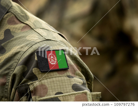 Flag of Afghanistan on military uniform. Army, troops, soldiers. Collage. Flag of Afghanistan on military uniform. Army, troops, soldiers. Collage. 109797276