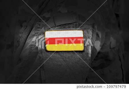 Flag of South Ossetia on military uniform. Army, armed forces, soldiers. Collage. Flag of South Ossetia on military uniform. Army, armed forces, soldiers. Collage. 109797479